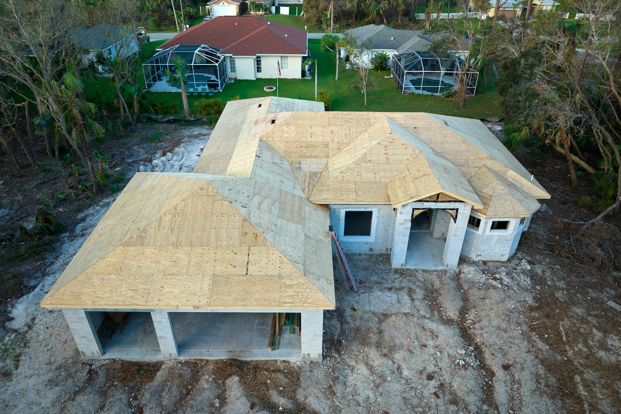 Aerial view of roof installation on new construction home in Wellington, Florida.